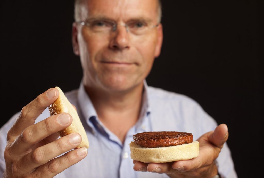 Mark Post presenting the first lab-grown burger in 2014. Credit: Mosa Meat/David Parry/PA