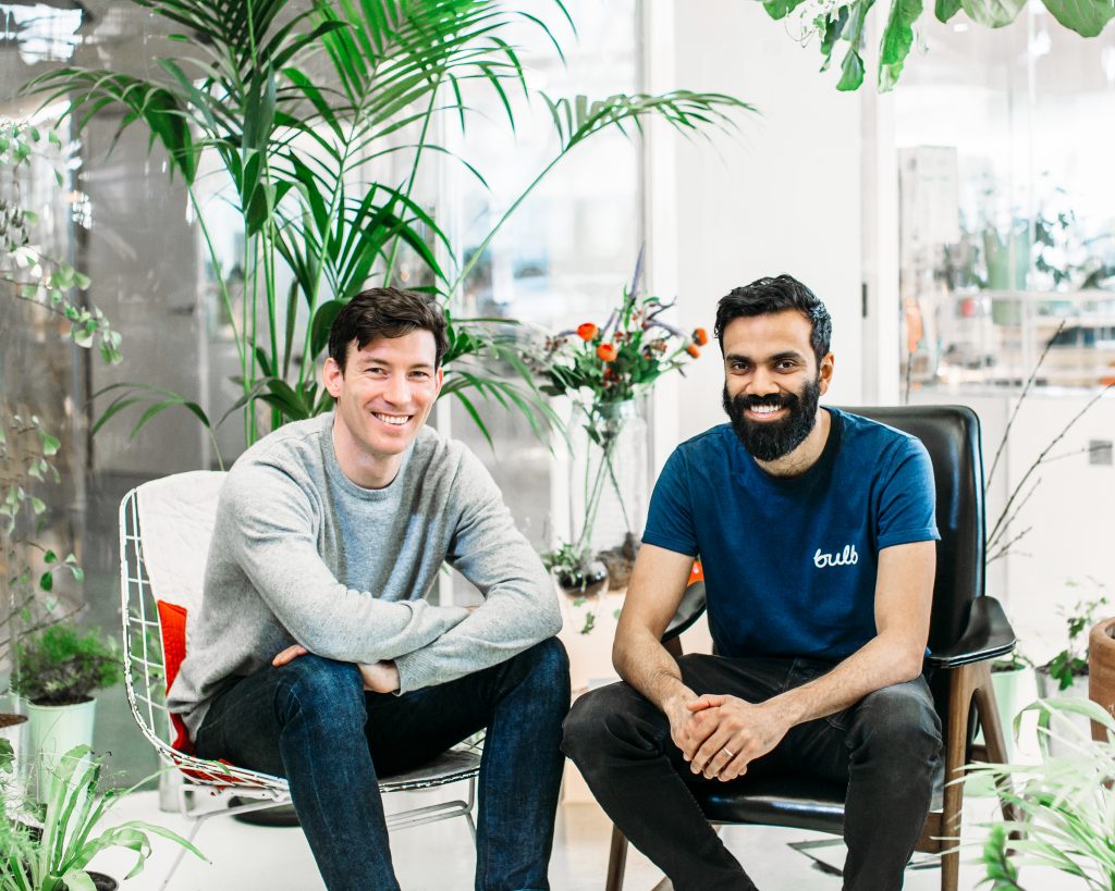 Photo of Bulb founders, Hayden Wood and Amit Gudka, in their leafy old office space.