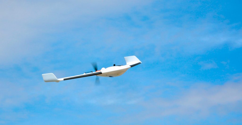 A photo by Delair showing one of its drones flying.