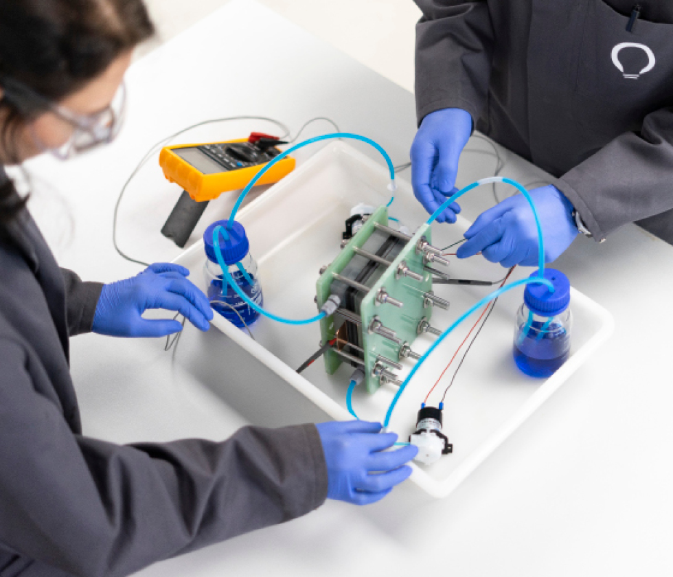 Engineers assembling a VoltStorage vanadium redox-flow battery