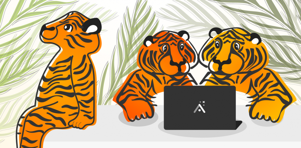 A cartoon image of some tigers looking at a laptop