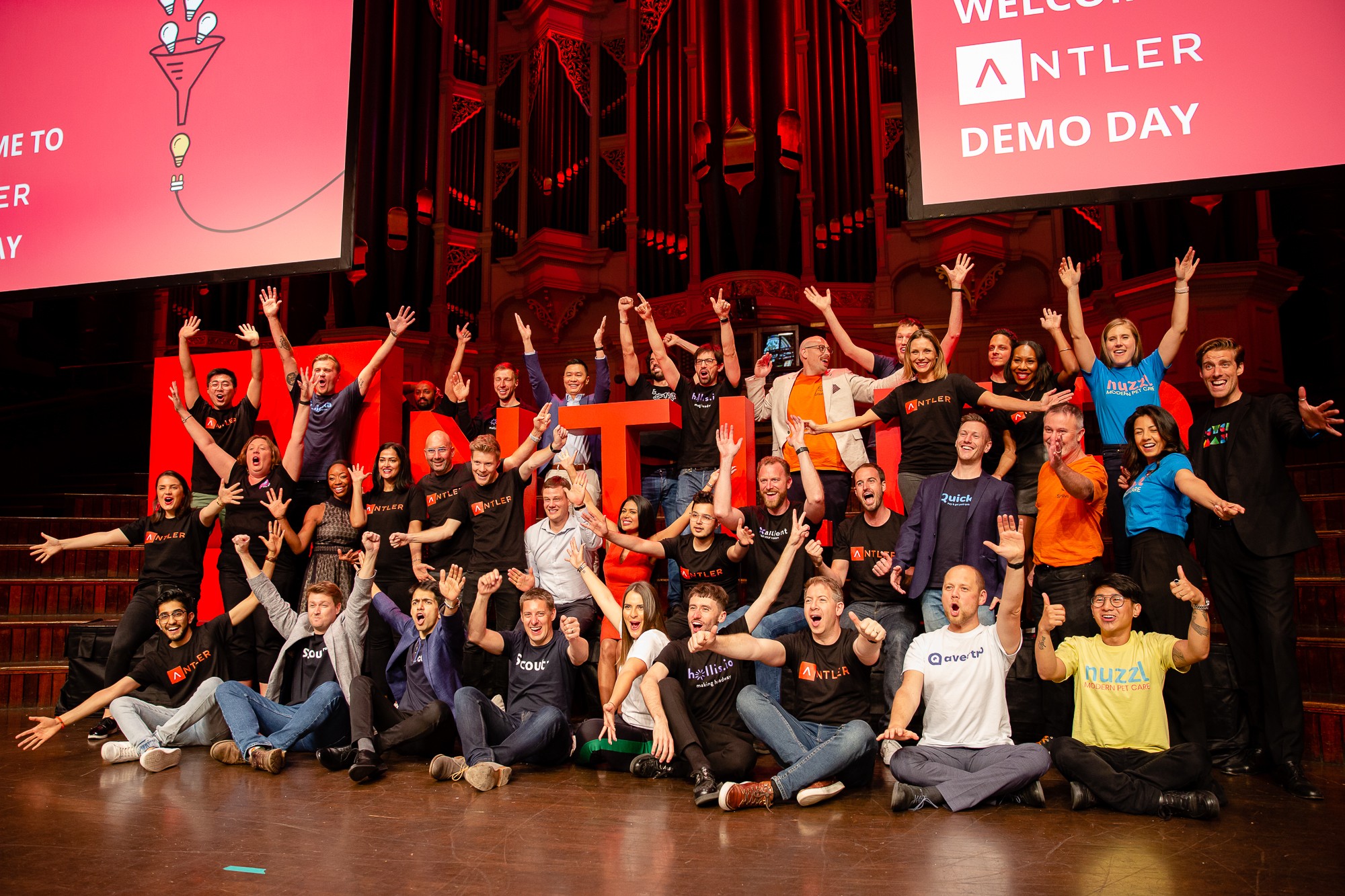 An image of a group of founders and Antler VC employees on stage at the firm's demo day