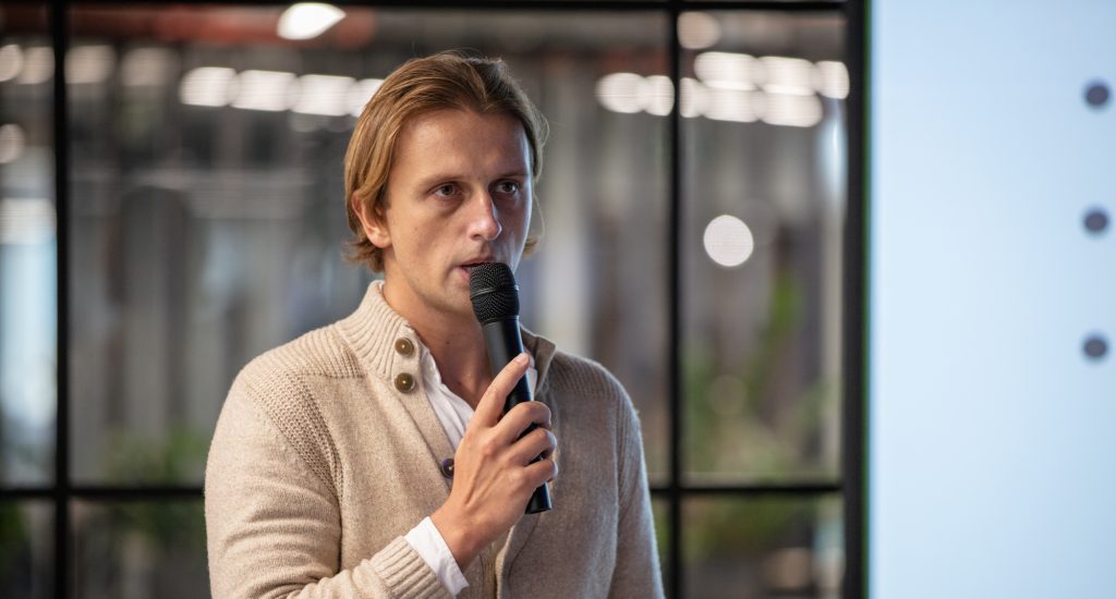An image of Revolut CEO Nik Storonsky speaking at an event