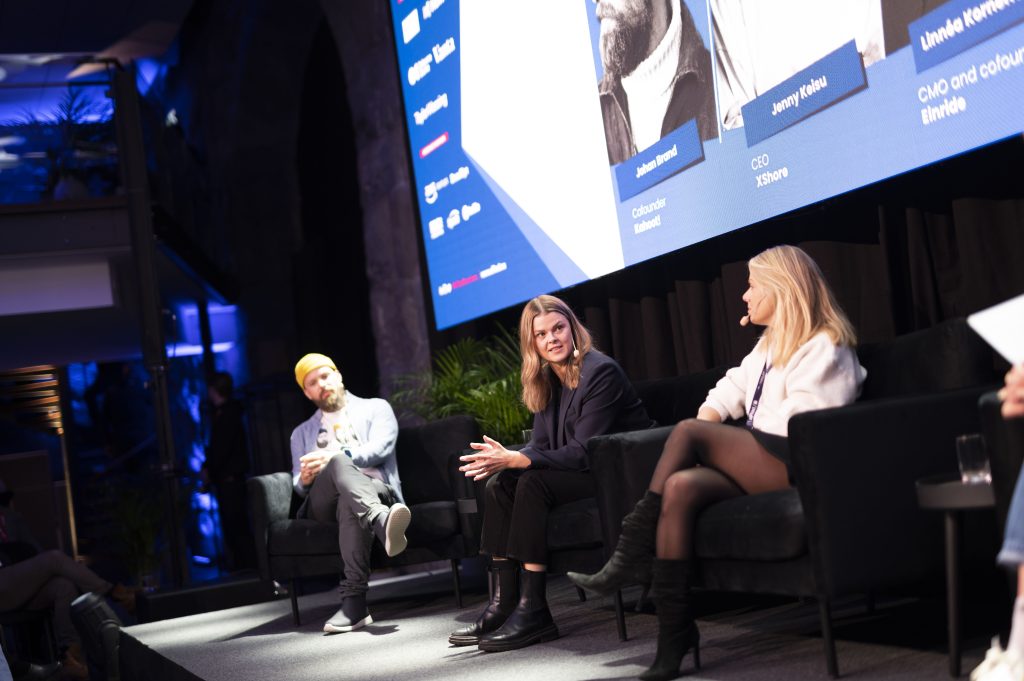 A photo of Johan Brand, cofounder, Kahoot!, Linnéa Kornehed Falck, CMO and cofounder, Einride and Jenny Keisu, CEO, XShore sitting on stage at a panel at Sifted Sessions / Stockholm